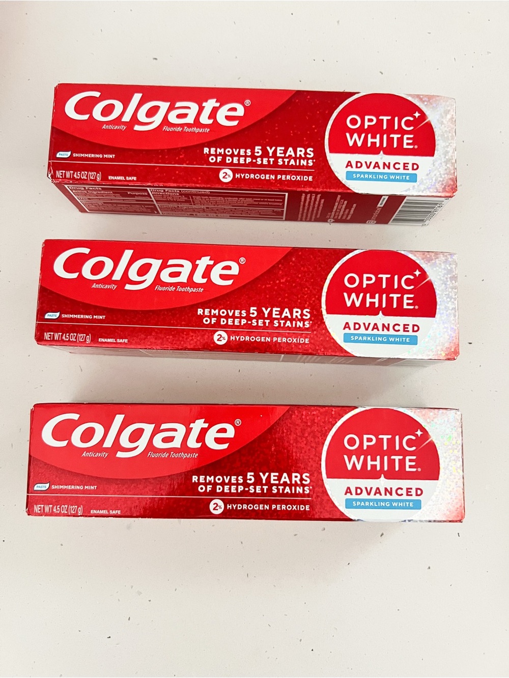 New Colgate Optic White Advanced Toothpaste - Sparkling White bundle of 3